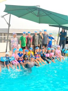 Summer Camp Concludes at Barasti Club, Kazani Heights with Certificate Distribution Ceremony 2 Children receiving certificates at Summer Camp 2026 closing ceremony held at Barasti Club Kazani Heights Islamabad